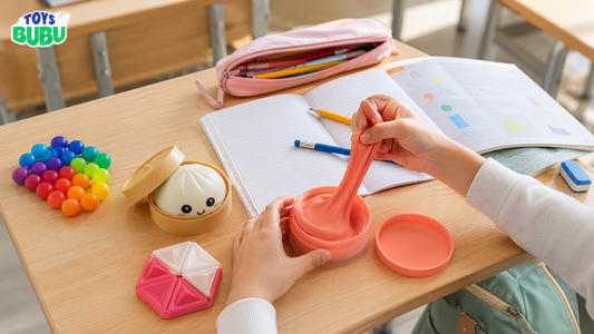 Teacher-approved fidget toys for school on a desk with ToysBubu sensory toys, backpack, lunch bag, and quiet classroom-safe fidget options