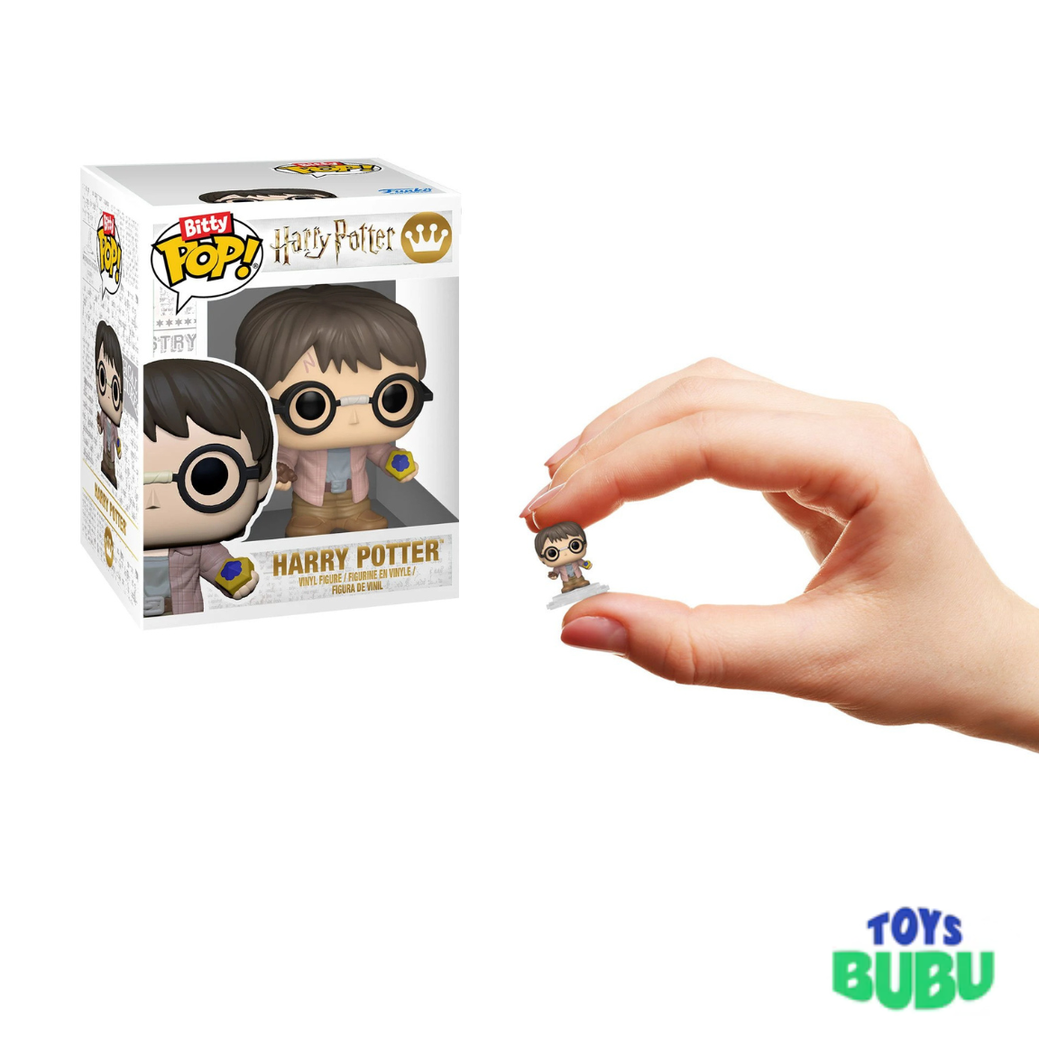 Funko Pop! Harry Potter figure held by a hand next to its packaging on a white background.