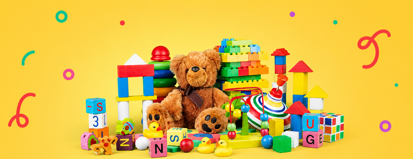 Educational toys for kids including blocks, puzzles, teddy bear, and creative play toys on a bright yellow ToysBubu homepage banner